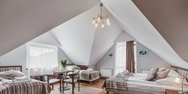 Čtyřlůžkový pokoj Standard s balkonem