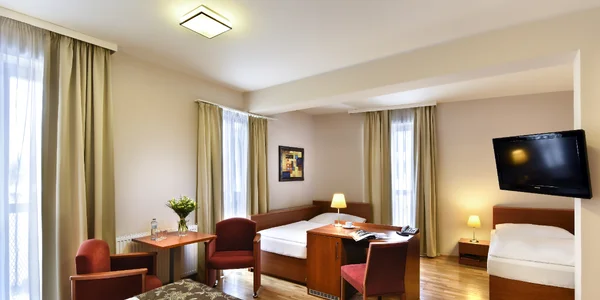 Čtyřlůžkové pokoje bez přistýlky 208, 307 (26 m²)