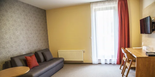 Třílůžkový apartmán – Standard (38 m²)