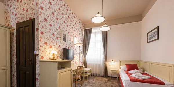 Dvoulůžkový pokoj s oddělenými lůžky (20–24 m²)