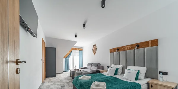 Čtyřlůžkový pokoj s balkonem