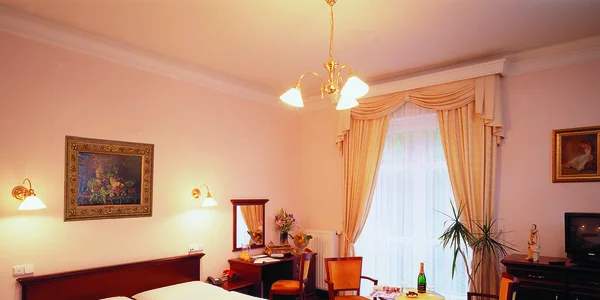 Dvoulůžkový pokoj s balkonem (22–25 m²)