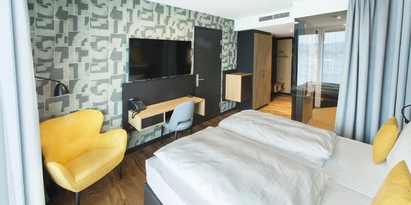 Štvorlôžková izba Business s balkónom (44 m²)