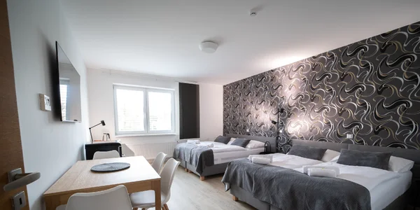 Čtyřlůžkový apartmán v prvním patře s vanou
