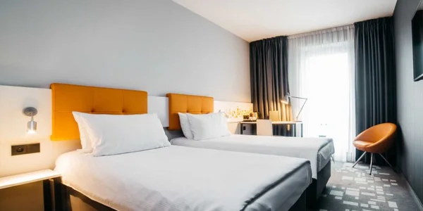 Dvoulůžkový pokoj s oddělenými postelemi (20–22 m²)