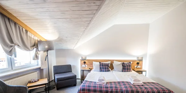 Dvoulůžkový pokoj Komfort s přistýlkou (26 m²)