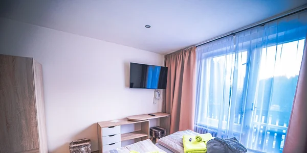 Dvoulůžkový pokoj část B** (18–22 m²)