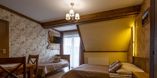 Trojlôžková izba Deluxe (21–26 m²)