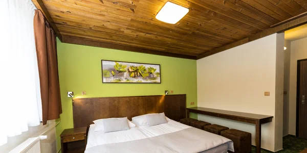 Čtyřlůžkový (2 ložnice + kuchyňka) (32 m²)