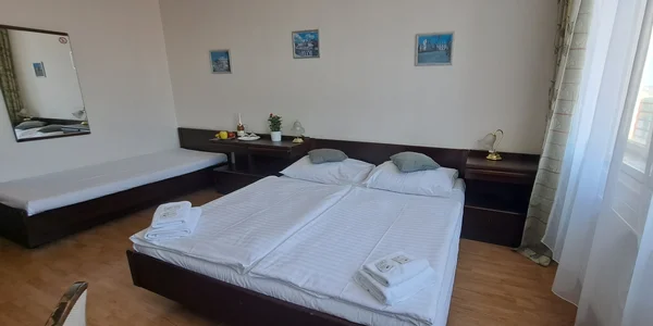 Třílůžkový pokoj (26 m²)