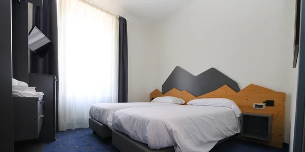 Deluxe propojený čtyřlůžkový pokoj