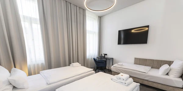 Trojlôžková izba v zníženom prízemí (22 m²)