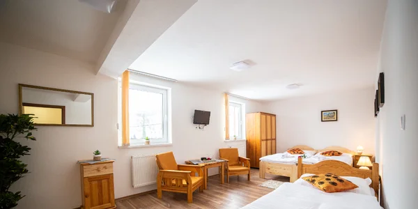 Třílůžkový pokoj (26 m²)