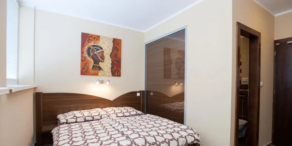 Dvoulůžkový pokoj s manželskou postelí (17 m²)