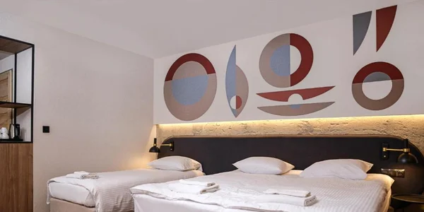 Třílůžkový pokoj (24 m²)