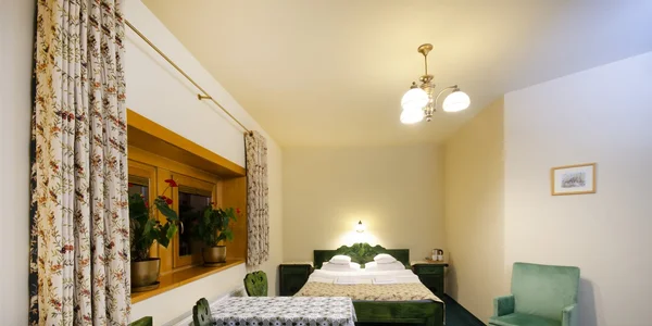 Čtyřlůžkový pokoj (26 m²)