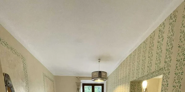 Dvojlôžkový apartmán s manželskou posteľou a kuchynkou