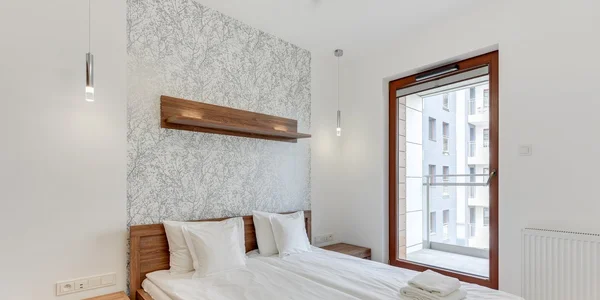 Pokoj se 2 ložnicemi a balkonem (55–60 m²)