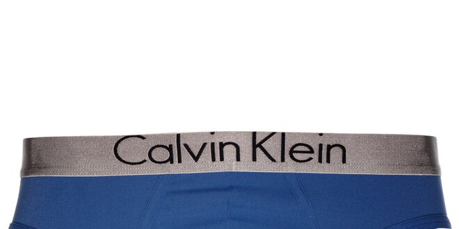 Pánské modré slipy Calvin Klein se stříbrným lemem