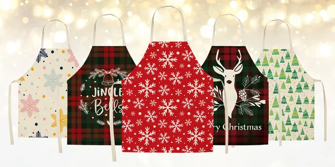 Zástěry s vánočními motivy: vločky, sob i stromky