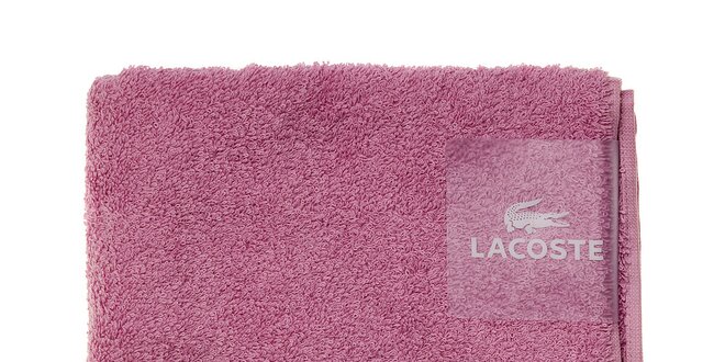 Sytě růžový ručník Lacoste