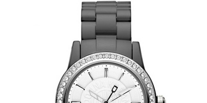 Dámské analogové hodinky s kamínky na lunetě DKNY
