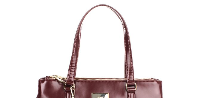 Dámská kožená kabelka ve vínovém odstínu s kulatým přívěskem DKNY