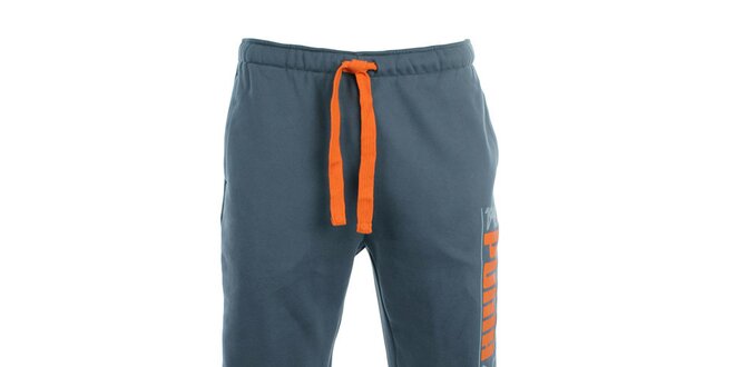 Pánské šedé teplákové kalhoty s oranžovými prvky Puma