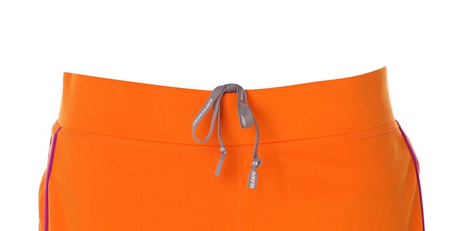 Dámské oranžové šortky s lemem Nike