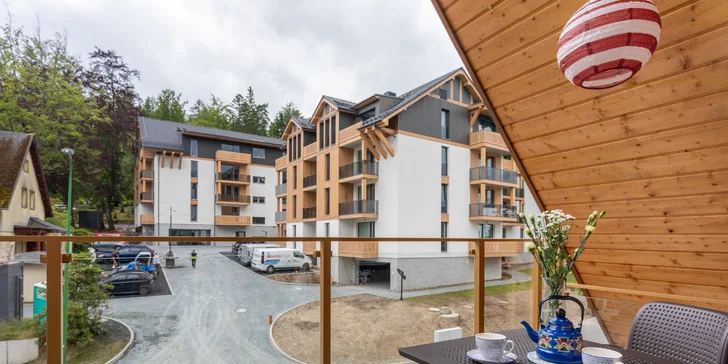 Apartmán Deluxe nabízí také posezení na malé zahrádce.