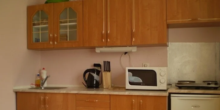 Vybavená kuchyňka apartmánu
