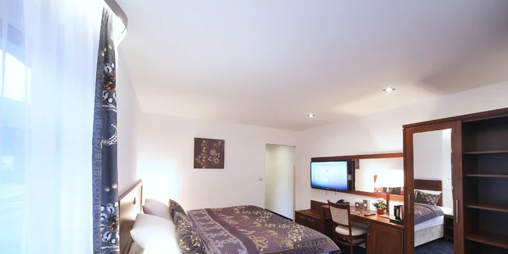 Pobyt v historickém hotelu v centru Špindlerova Mlýna se snídaní či polopenzí