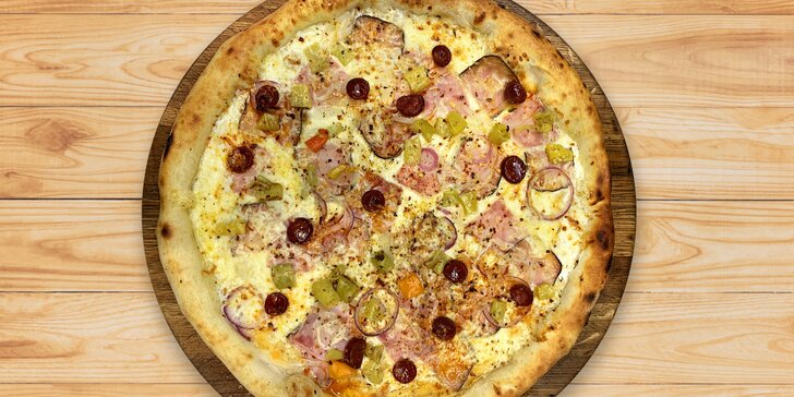 Čtvrtka pizzy podle výběru v bistru Rud´s pizza na Borech