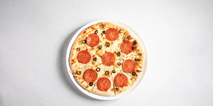 Dokonalá italská pizza ve Vršovicích: 1–5 kol se sýry i uzeninami či ananasem, lahev prosecca i nápoje