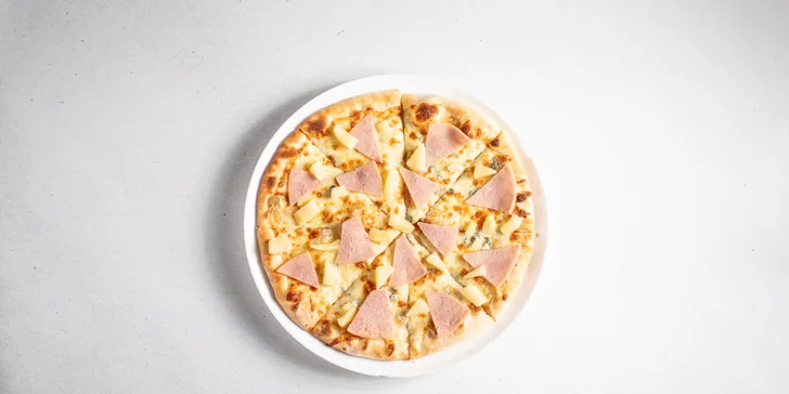 Dokonalá italská pizza ve Vršovicích: 1–5 kol se sýry i uzeninami či ananasem, lahev prosecca i nápoje