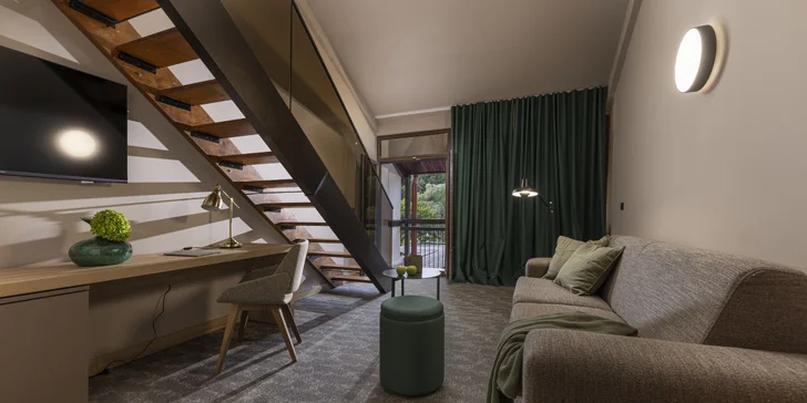 Apartmán Jezerčica má oddelenú spálňu a obývaciu časť.