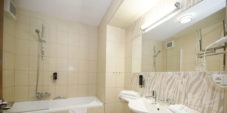 4* hotel ve stylu první republiky: pobyt se snídaní v pokoji či luxusním apartmá v centru Prahy