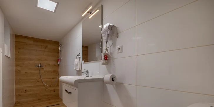 Pobyt v apartmánovém domě v Bešeňové se zahradou, altánem i grilem, kousek od aquaparku