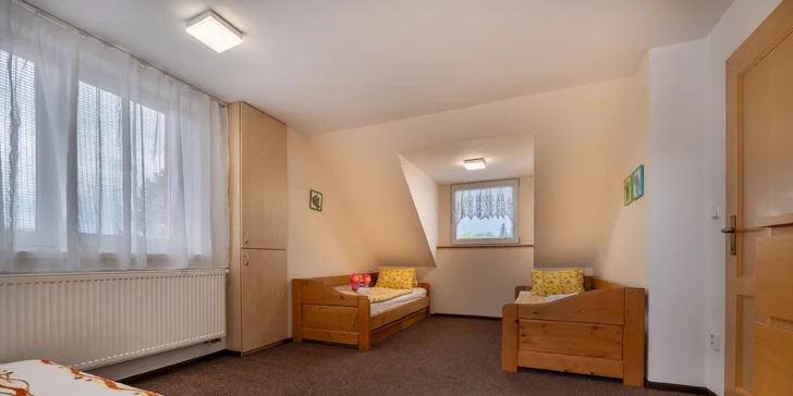 Pobyt v apartmánovém domě v Bešeňové se zahradou, altánem i grilem, kousek od aquaparku