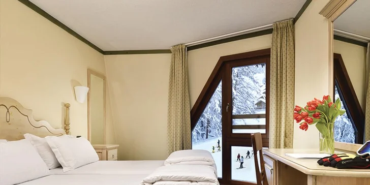 Zimní dovolená v Itálii: hotel přímo na svahu ve skiareálu Pila, polopenze a wellness