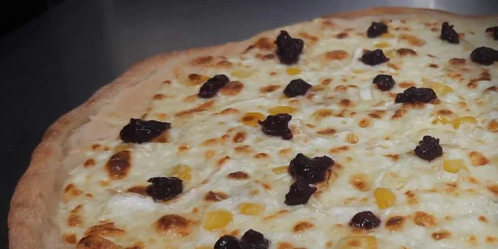 Až 2 pizzy podle výběru z 9 druhů na odnos s sebou nebo rozvoz