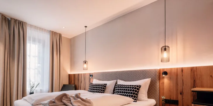 Krásný hotel ve Schladmingu: wellness a střešní bazén, polopenze plus a sommercard s lanovkami zdarma