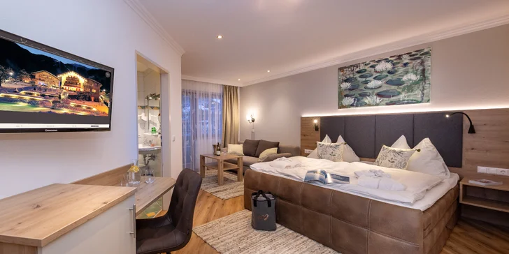 Boutique hotel v Zell am See: wellness s přírodním jezírkem, polopenze i karta výhod