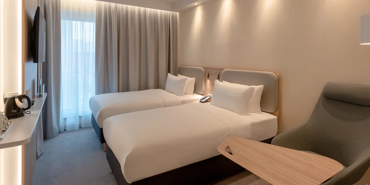 Moderní hotel v Mnichově s bufetovou snídaní: blízko veletržního centra i BMW Weltu
