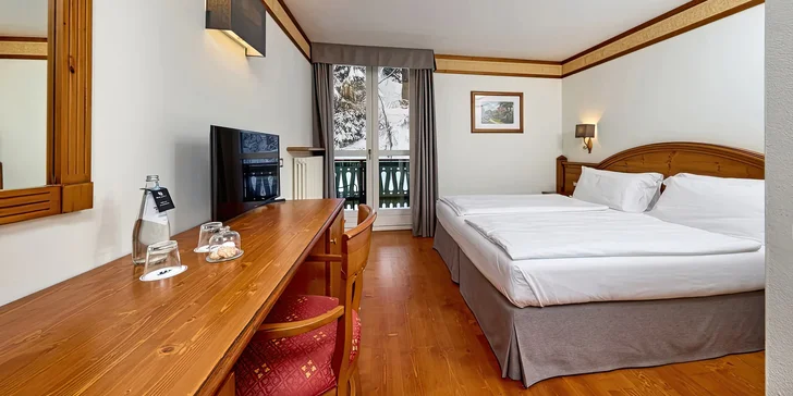 Zimní dovolená v Dolomitech: 4* hotel s polopenzí a bazénem, skiareál 800 m, Cortina d´Ampezzo 15 km