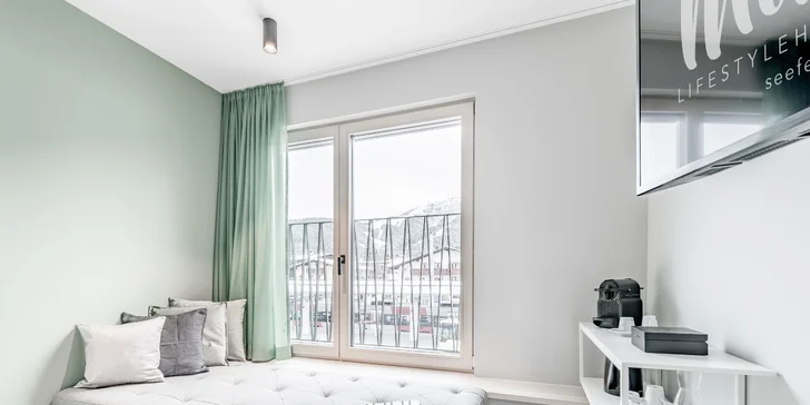 Boutique hotel v Seefeldu: střešní wellness a snídaně, v zimě sjezdovky i běžky