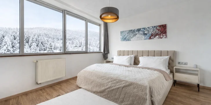 Wellness pobyt ve 4* hotelu Holiday Inn s panoramatickým výhledem na město a skipasy se slevou