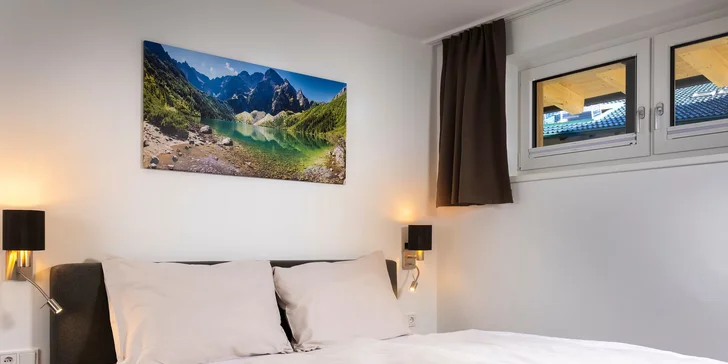 Apartmán má 2 ložnice i 2 koupelny.