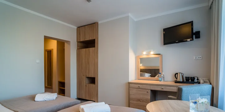 Pro váš dokonalý odpočinek je připravený dvoulůžkový pokoj (14–16 m²) s možností přistýlky.