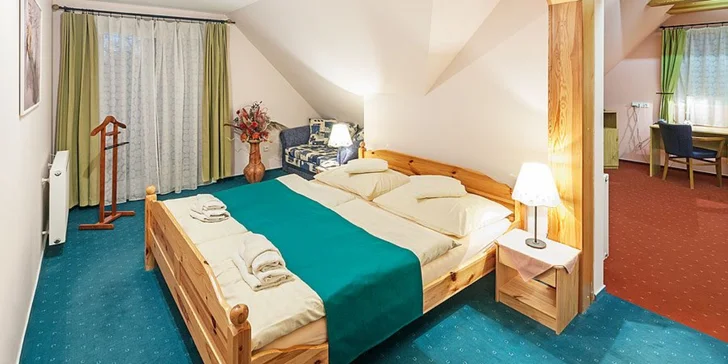 Zabydlíte se v pěkně zařízeném pokoji Standard či prostornějším Comfort. 